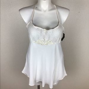 Deligates white lace 2 pc gown with panties size large fits like a XL.